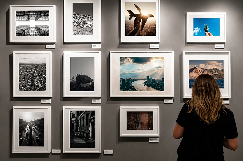 modern gallery exhibition with framed photographs